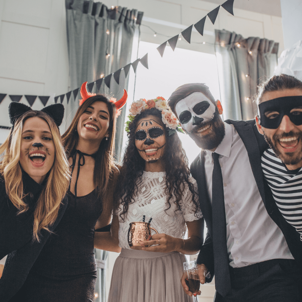 Friends at a Halloween Party in freaky Halloween costumes